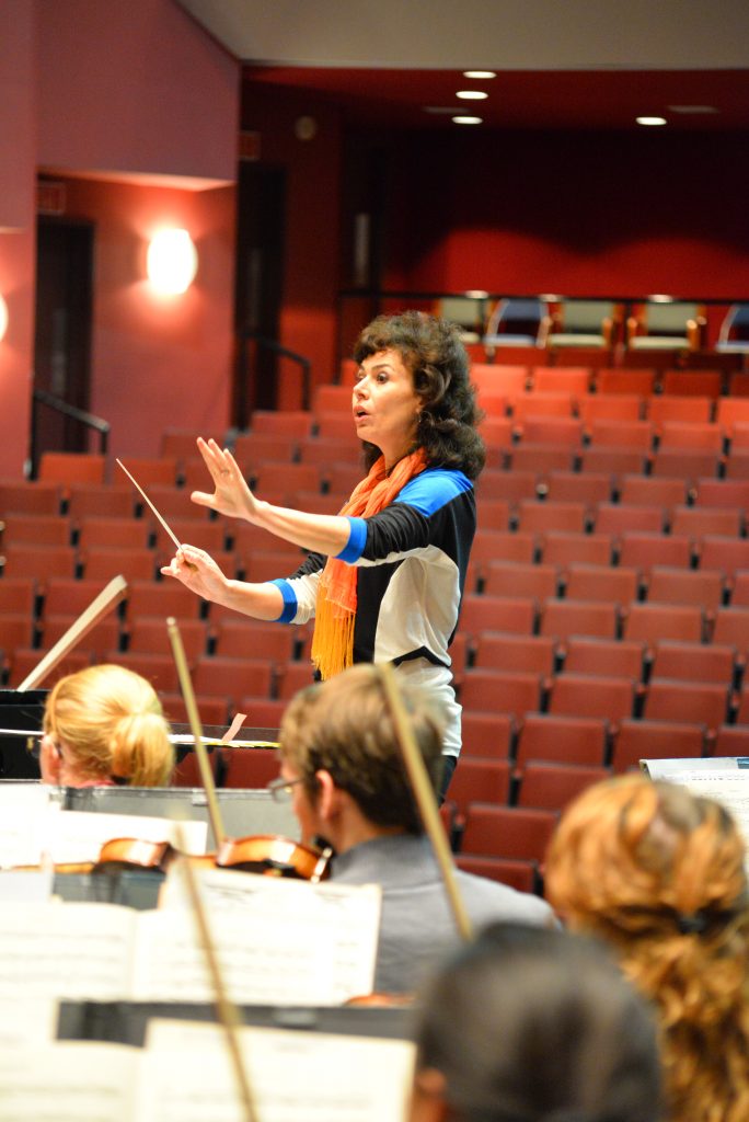 Suzanna convinced Dr. Donald Portnoy, now retired music director of the USC Symphony Orchestra, to collaborate with the local community orchestra as a community outreach. Suzanna was an assistant conductor of LMSO from 2012-2014. February of 2014, Koger Center for the Arts, dress rehearsal between USC Symphony and Lake Murray Symphony orchestras’ joint performance. Suzanna conducted Tchaikovsky’s “Marche Slave,” Op. 31.  Photography courtesy of Dimitry Pavlovsky