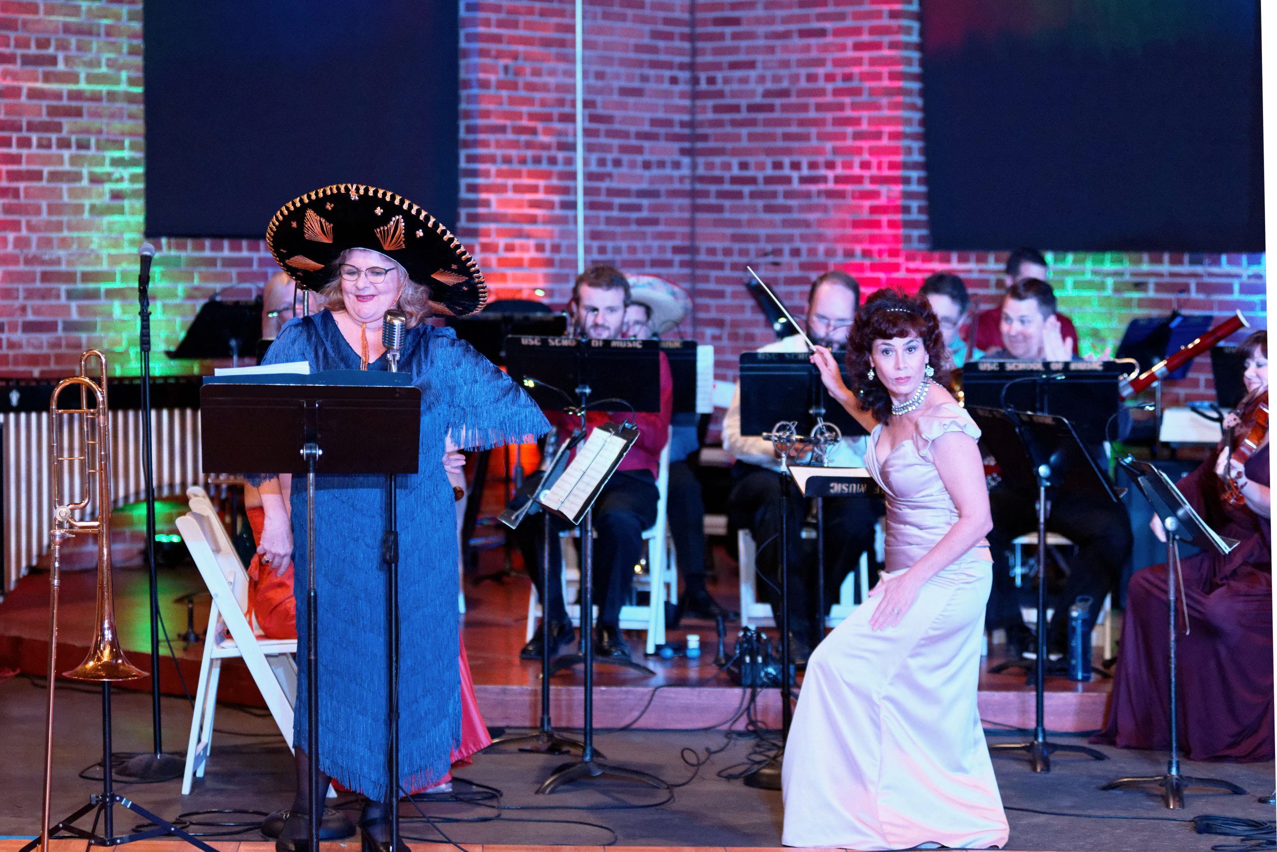 Ensemble Eclectica’s production of We Could Have Danced all Night! from 2018. Janet Hopkins sings “Mexican Hat Dance” with folk song arrangement by Dick Goodwin. Suzanna is Ensemble Eclectica’s founder, artistic and music director. Photography courtesy of Dimitry Pavlovsky
