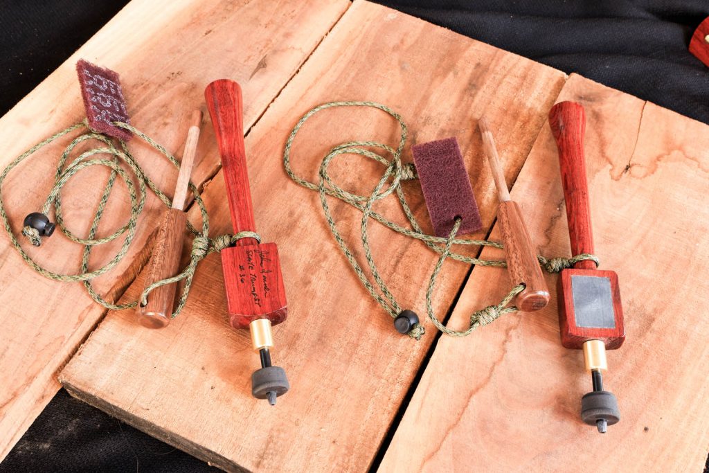 John is currently perfecting a trumpet call, which many old-time veterans of the sport consider the finest of all the many types of calls when it comes to replicating turkey sounds.  They also acknowledge it is perhaps the most difficult to master in terms of usage.  Slate/trumpet turkey calls made from Bubinga, African rosewood.