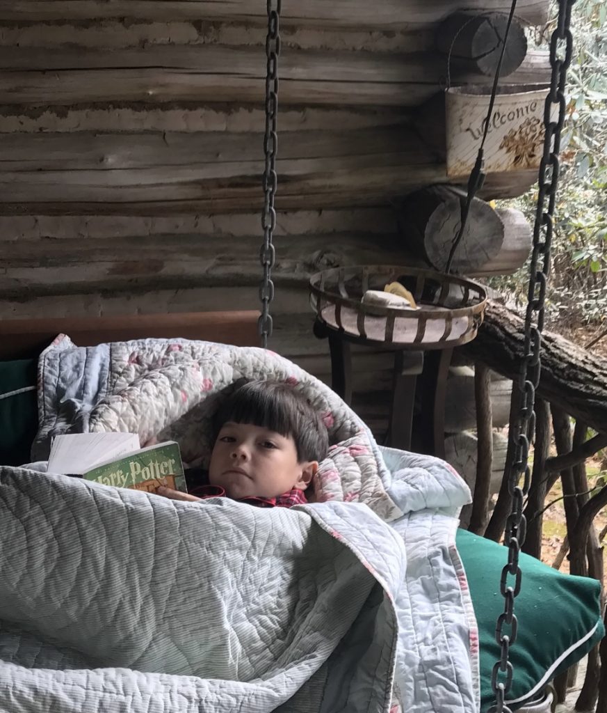 Karen and Allan’s grandson, Joe, loves reading on the bed swing, even when it is cold. 
