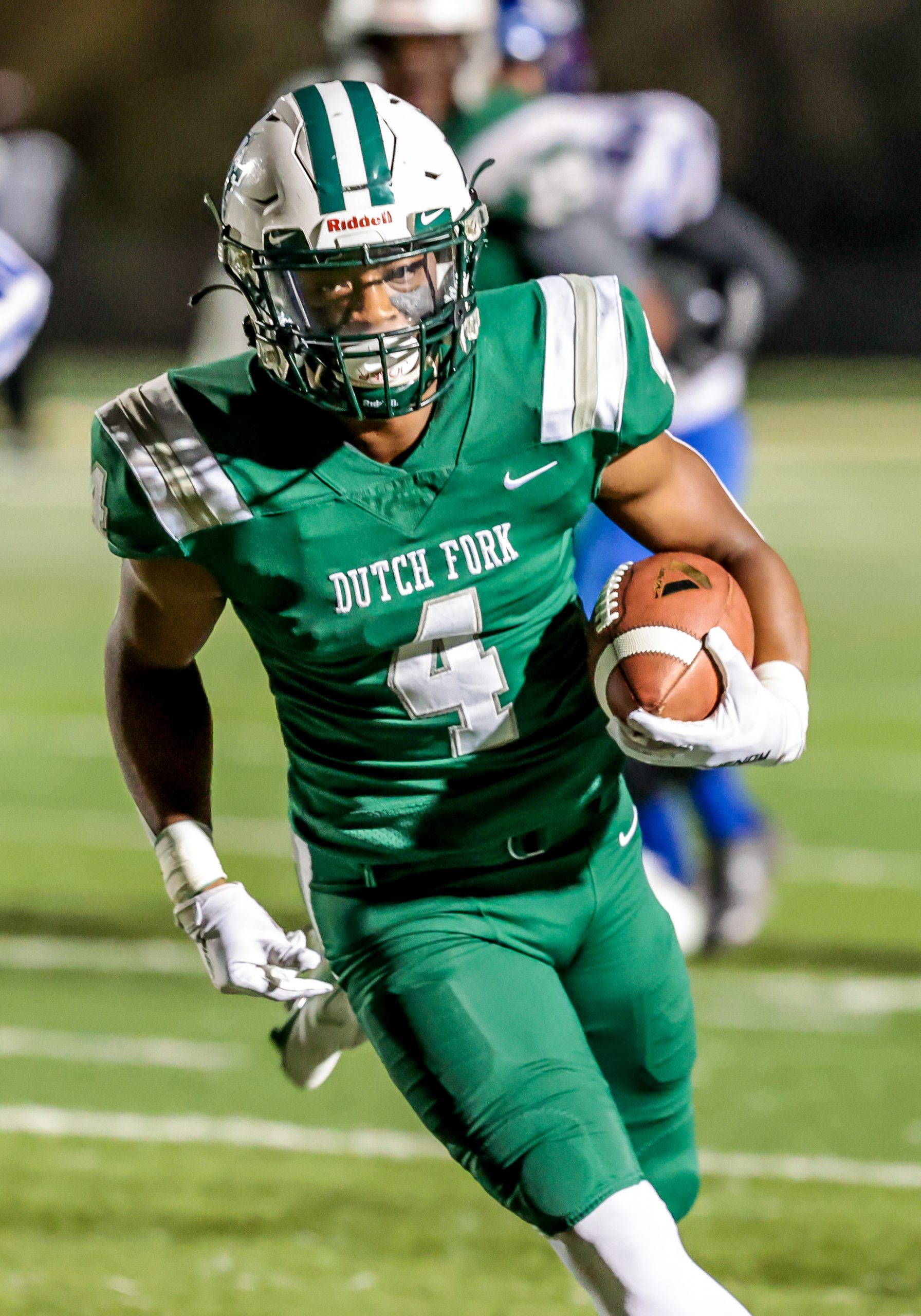 The Dutch Fork Silver Foxes had won five straight state championships and had an unbeaten streak of 62 games until their streak ended with a 22-19 loss to Gaffney in the state title game. Running Back Jarvis Green carries the ball for a first down. 