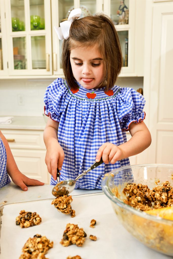 Know yourself. Maybe you have fun in the kitchen and can let go when doing a project with a child. The problems come when you are anxious and tense while you are teaching a child a new skill — then no one has fun. Let the children take turns mixing the cookie dough and scooping it onto the baking sheet.
