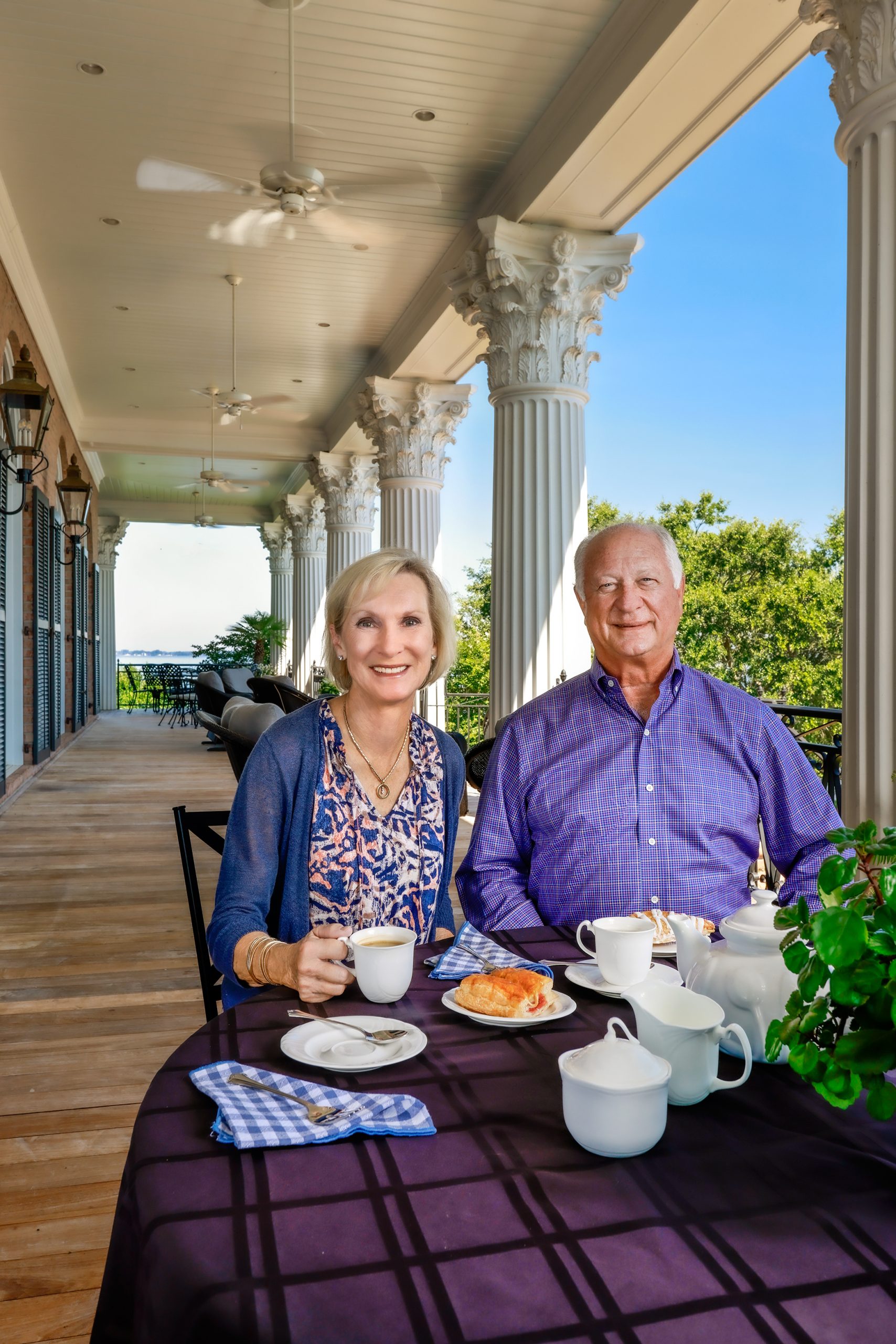 The 8,000 square feet of porches are made with Brazilian walnut and scattered with numerous seating areas for relaxing, reading, visiting, and dining. Cathy and Kenyon love to have coffee outside their bedroom and enjoy the expansive views.
