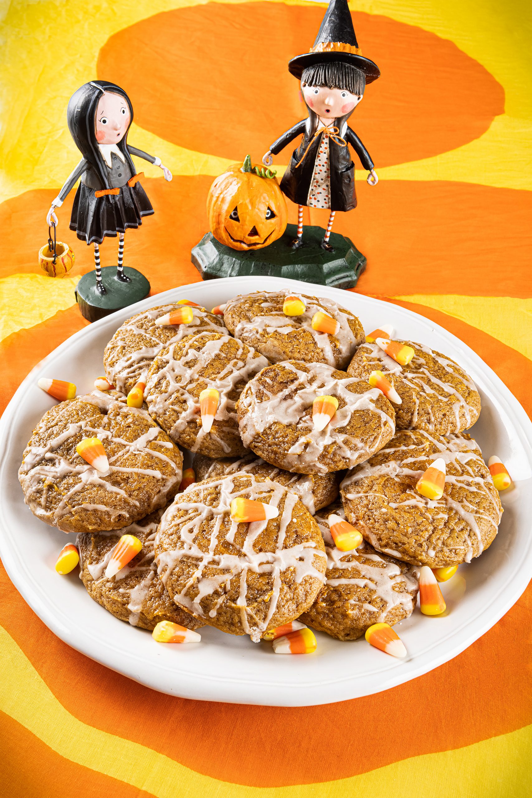 Pumpkin is such a seasonally popular item that folks just can’t seem to get enough in the fall. Try the soft maple-glazed pumpkin cookies for a crowd pleaser at any occasion. Trick-or-Treaters “Agatha & Jack” and “Little Goth Girl” courtesy of Cottage & Vine. Montes Doggett plate and scarf by Donna Gorman, courtesy of Kudzu Bakery & Design.