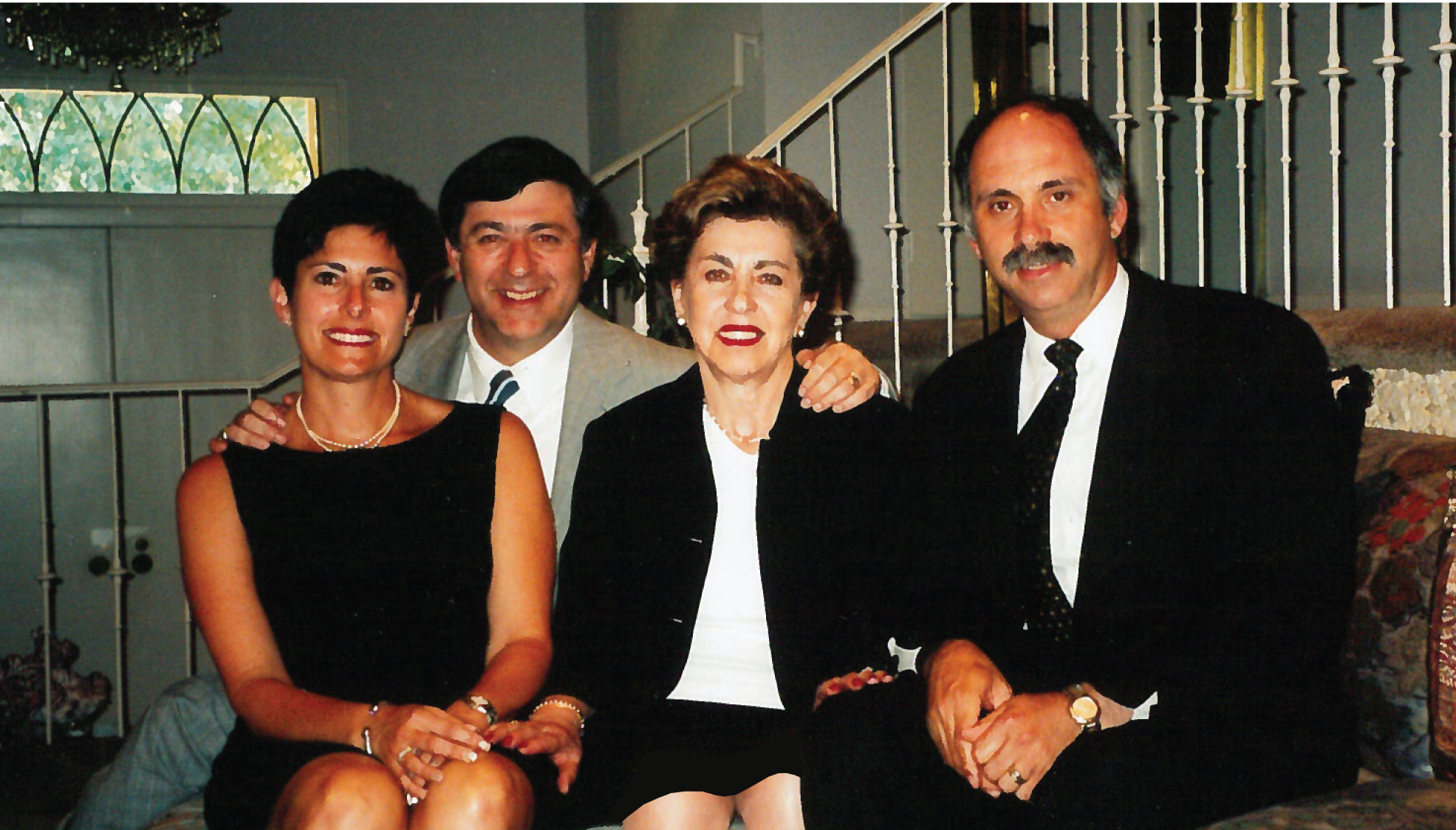 Bluma and Felix raised three children in Columbia — Henry, Karl, and Esther. This photo from 2003 shows Henry, Karl, and Esther with Bluma inside her home shortly after Felix’s passing. 