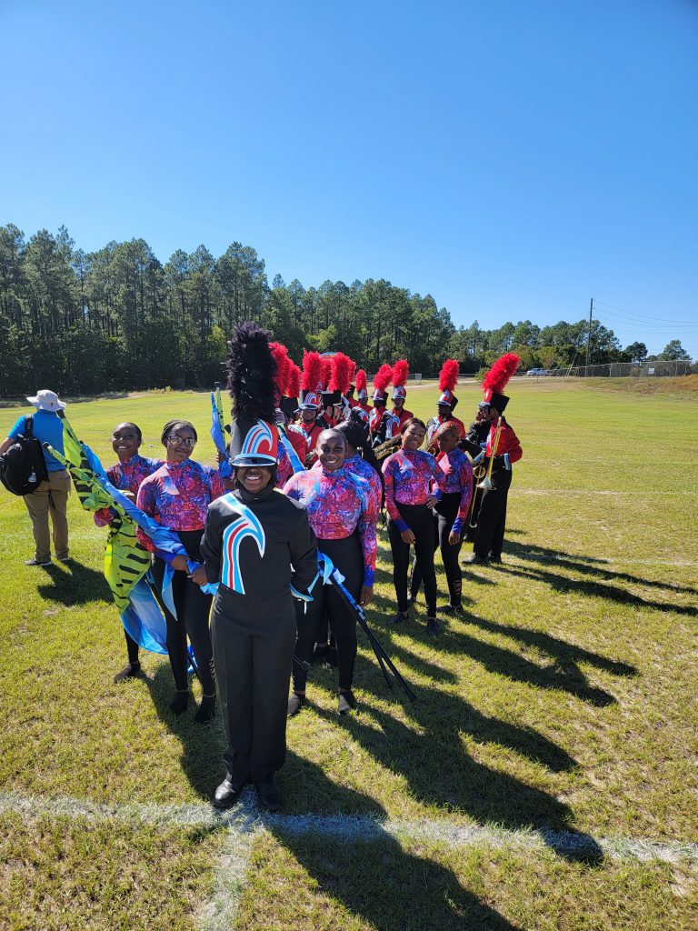 Flora Falcon Regiment members prepare to take field at the 2022 Midland Valley High School Mustang Classic. Photography courtesy of AC Flora Band Boosters