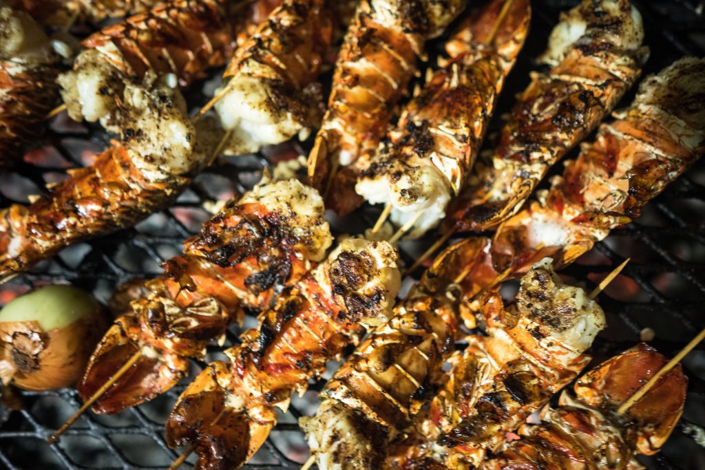 Mouth-watering, freshly grilled lobsters are one of the highly anticipated meals. Photography courtesy of Nick Swingle