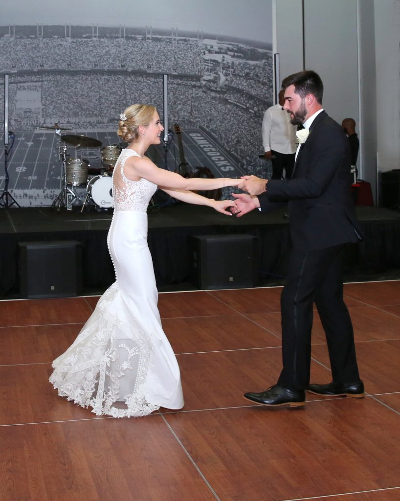 Natalie and Stanton danced to Can’t Take My Eyes Off You by Frankie Valli and the Four Seasons, performed at the reception by Finesse.