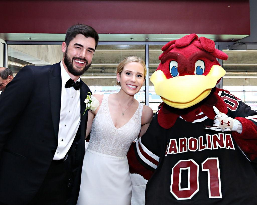  All current USC football special teams players attended the wedding, as well as many of the coaching staff. One special guest was Cocky. “His appearance was a surprise from my parents,” says Natalie. “It was so fun to have him there.” 
