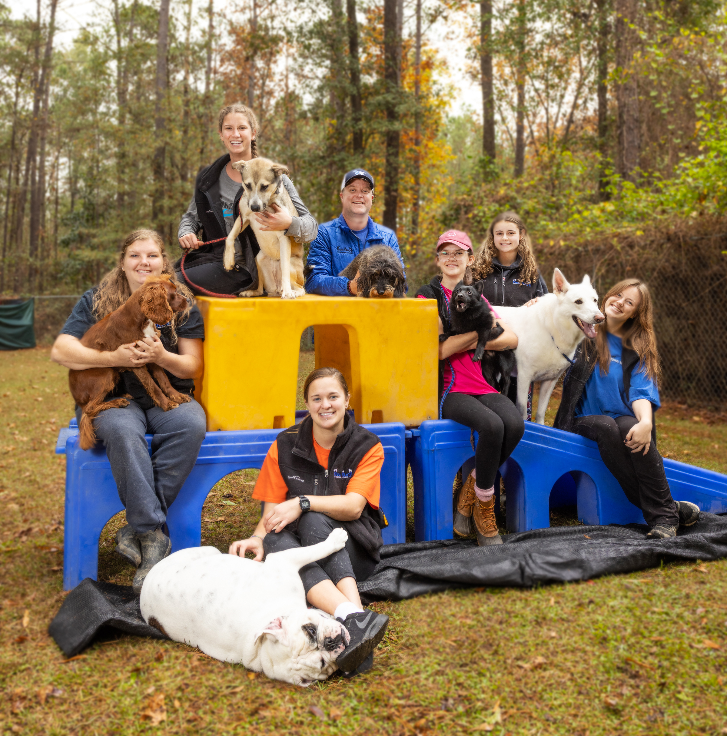 Give your pet a vacation! The 2023 winner for Best Pet Boarding is Dog Daze. Melissa with Buddy, Tanna with Belle, Janna with Brisket, Patrick with Piper, Robbie with Louie, Sarah (no dog), Emily with Buddy.
