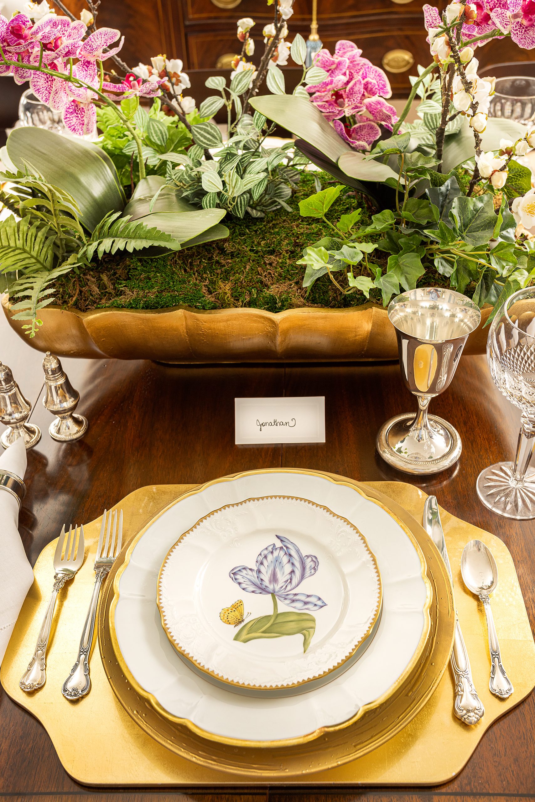 Mary Kirk sets a stunning table using Anna Weatherley Old Master Tulips china and Chantilly silver from her mother. Flowers courtesy of Cricket Newman 