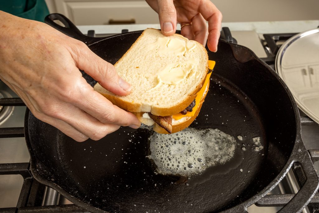 The basic ingredients of grilled cheese are bread, cheese, and butter. The method for cooking never changes … to accelerate the cheese melt, cover the pan while cooking the first sandwich side, then after your flip, leave the cover off to keep that crisp crust snappy. Have fun, try different combinations, and name one for yourself!