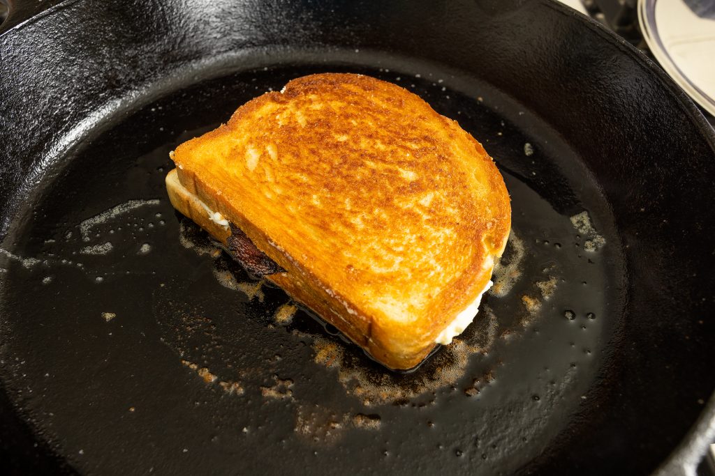The basic ingredients of grilled cheese are bread, cheese, and butter. The method for cooking never changes … to accelerate the cheese melt, cover the pan while cooking the first sandwich side, then after your flip, leave the cover off to keep that crisp crust snappy. Have fun, try different combinations, and name one for yourself!