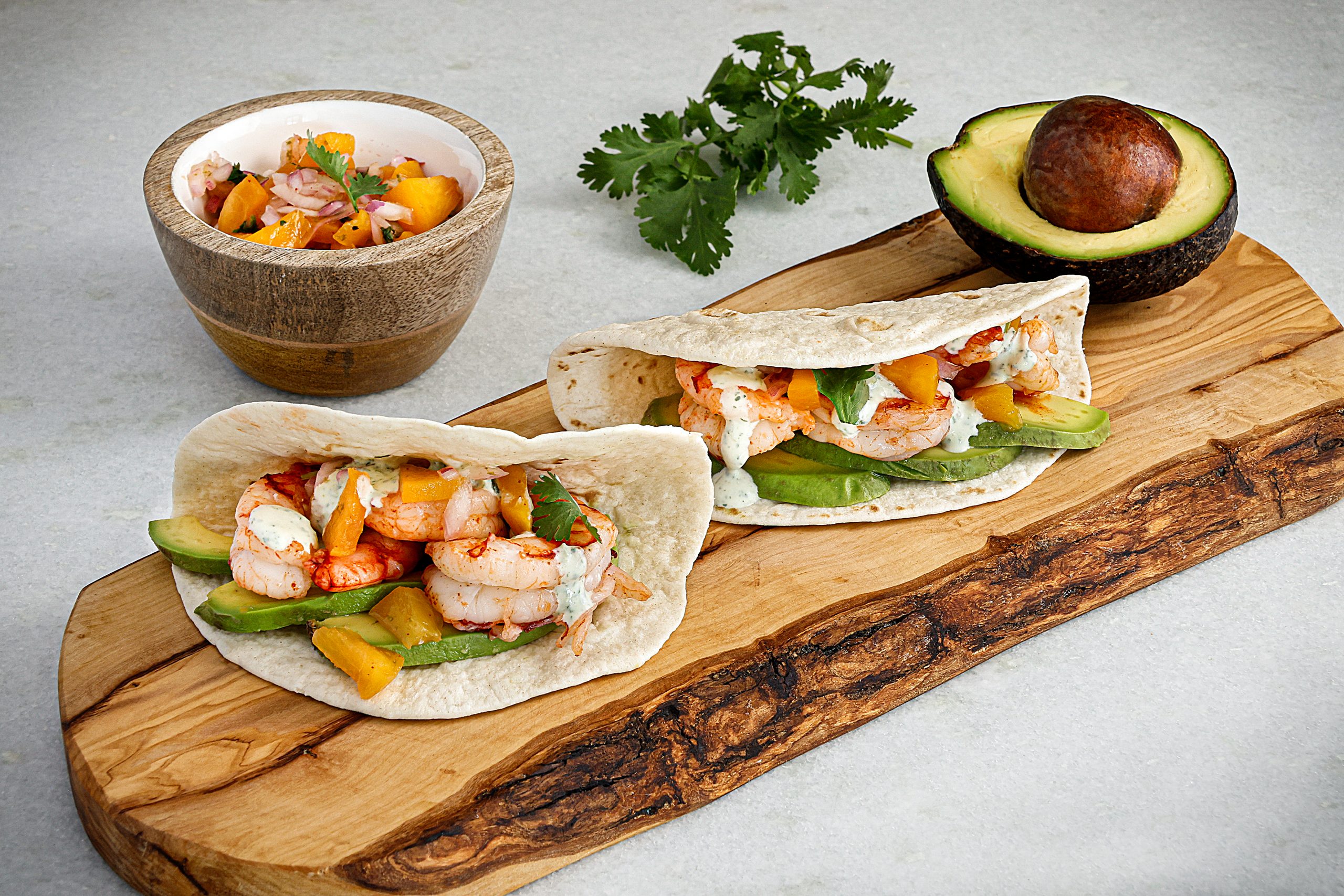 Full-on Summer Shrimp Tacos with Peach Salsa will be a fresh treat — keep the peach salsa under lock and key or it will magically disappear! BH mango & white enamel bowl courtesy of Kudzu Bakery & Market