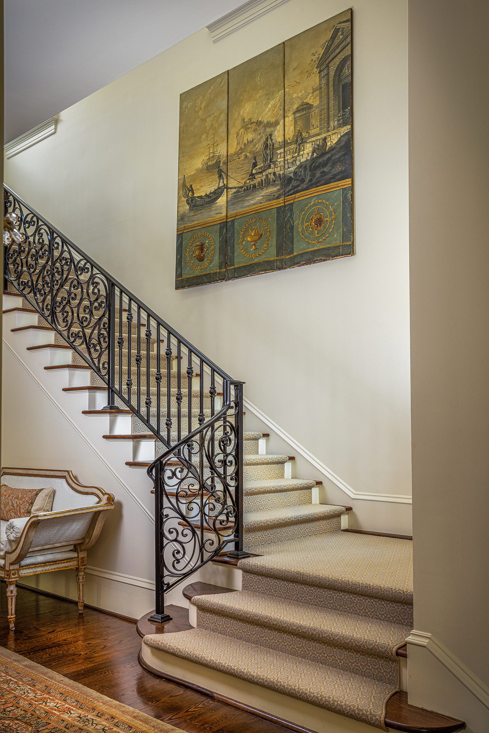 The antique screen in the stairwell was a recent find of Marion’s while in Charleston; it marries perfectly with the stairwell.  
