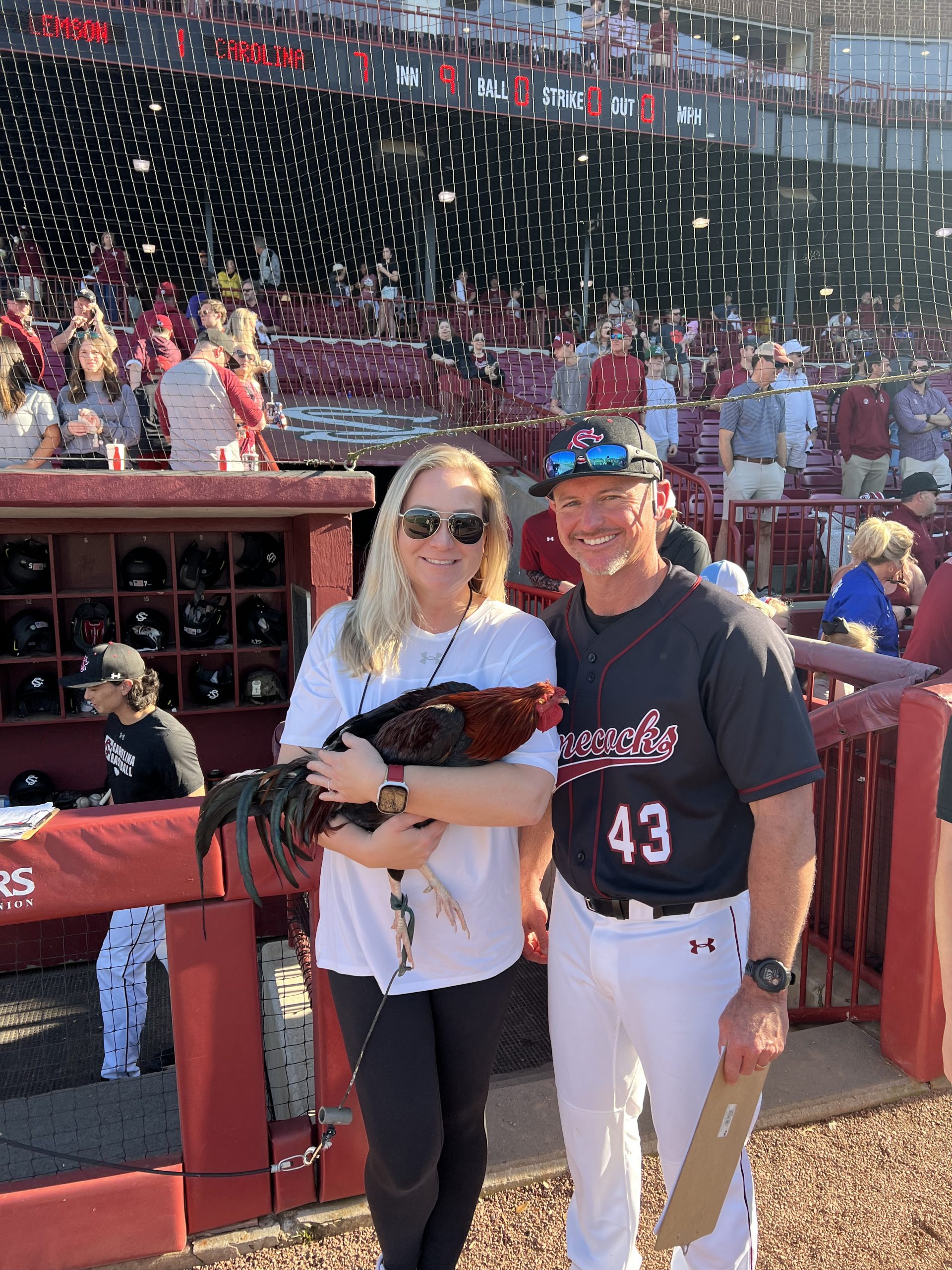 Eryn and associate head coach Monte Lee pose for a win — with a Gamecock!