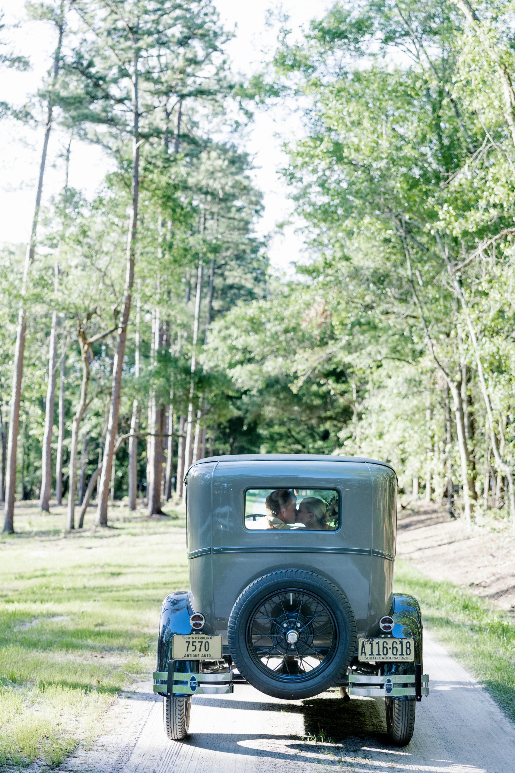 Blake and Bennett left the church and rode to the reception at the Relief Farm in a 1928 Model A Ford, lovingly called “Miss A” by the family. Blake’s grandfather’s grandmother originally purchased it in 1928. 