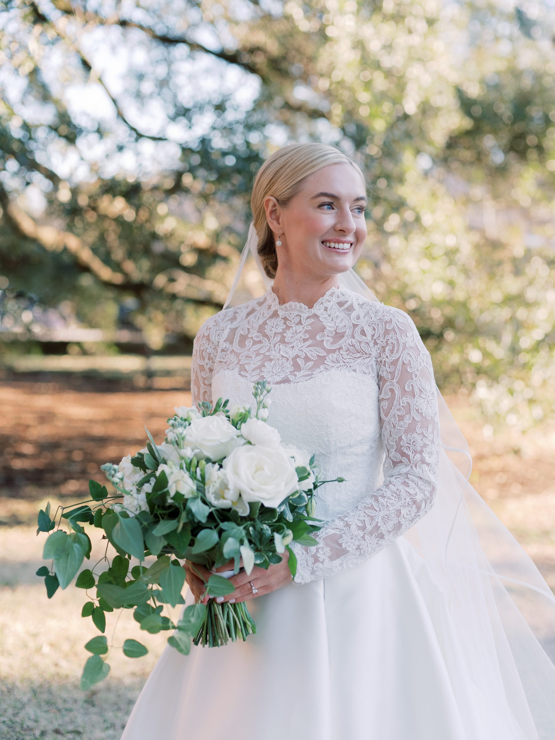 Meg found the dress of her dreams at Hayden Olivia Bridal, which included a lace bolero for the wedding ceremony. Her parents gave her a family heirloom diamond brooch, which Heathcliff Jewelers made into a comb for Meg to wear in her hair on the wedding day. 