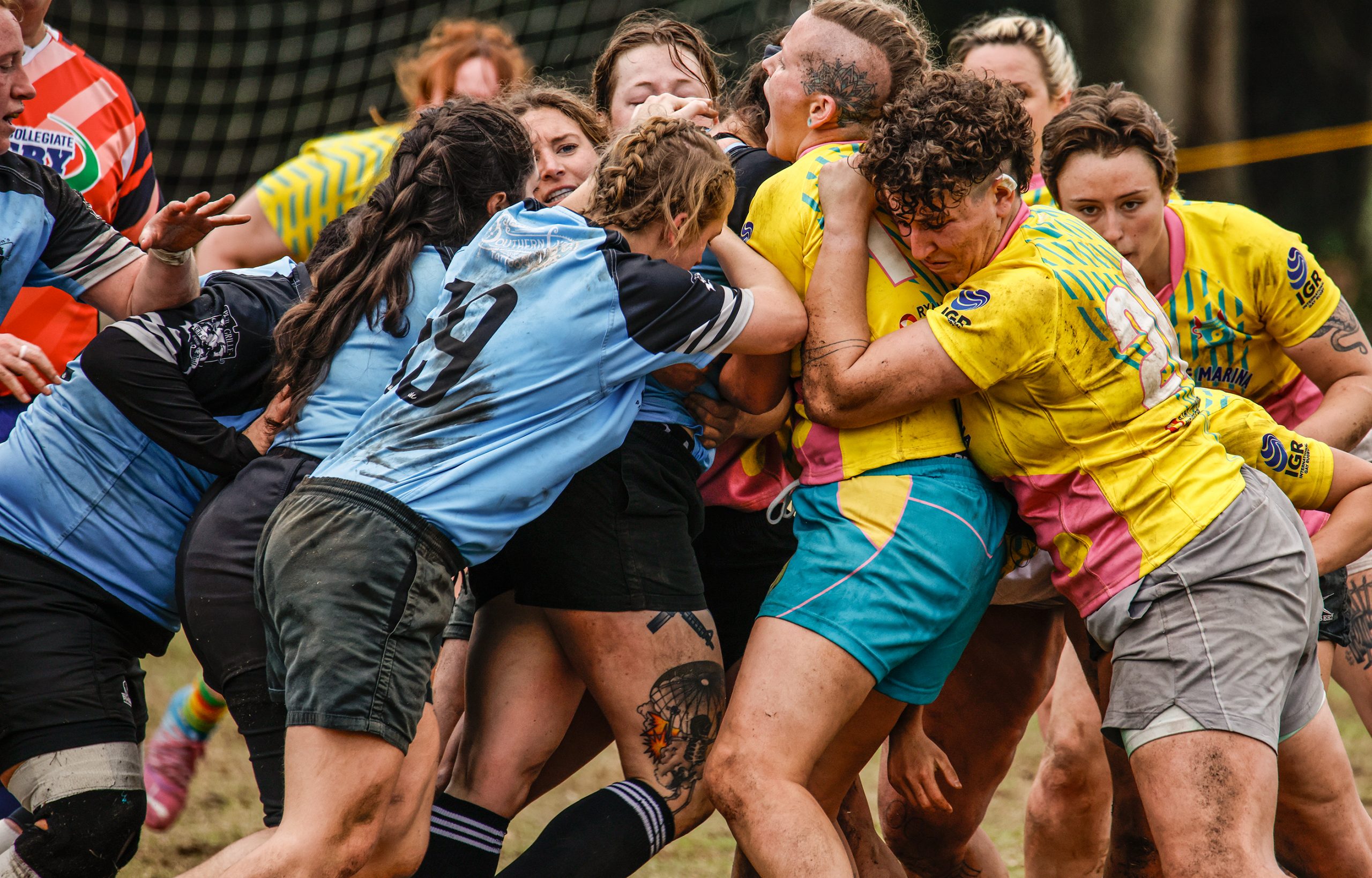 Rugby is a game of true grit and physical endurance. This photo captures the passion and determination on each player’s face during an intense moment of the game. 
