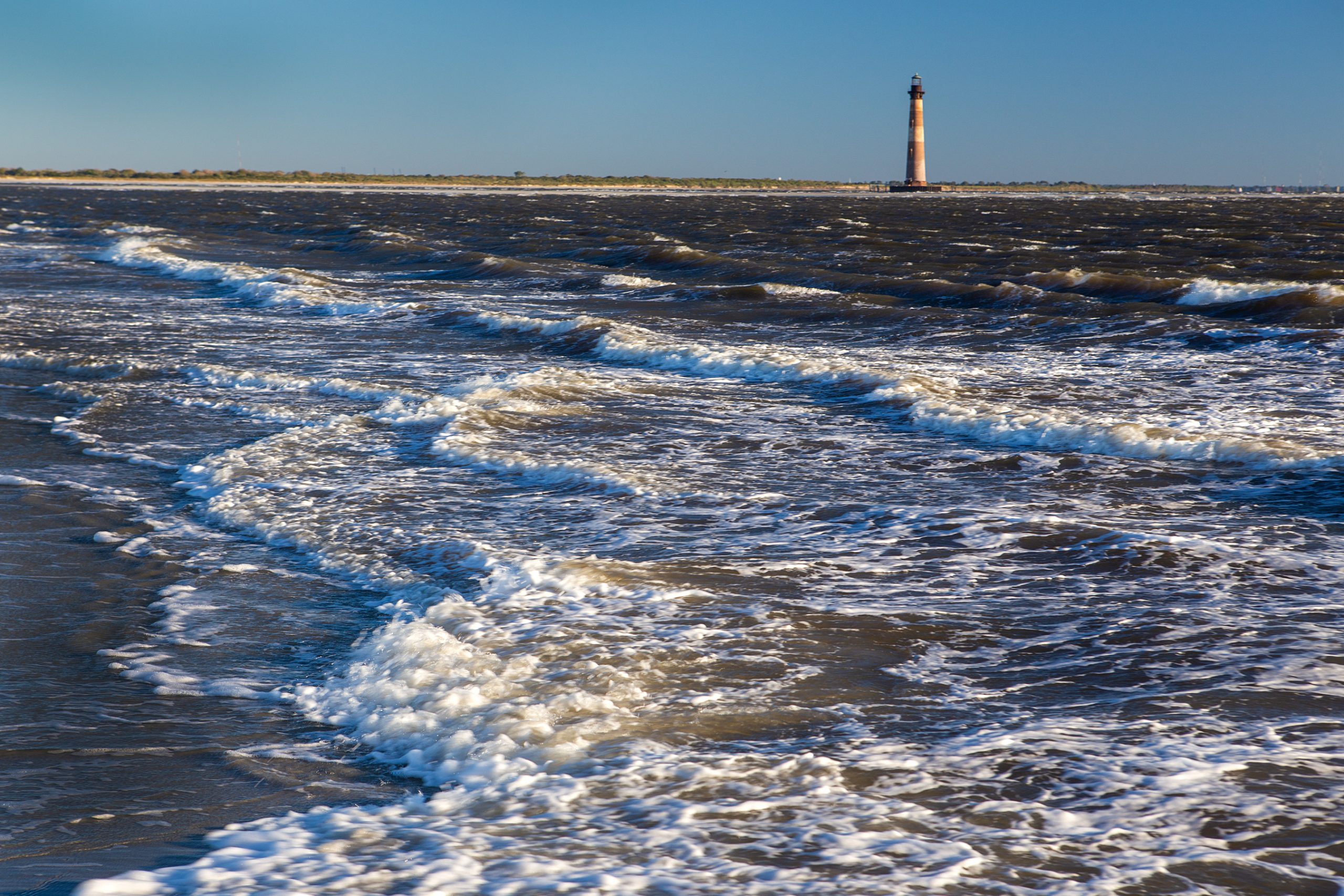 On the north end of Folly, the Morris Island Lighthouse stands alone on Morris Island. Opened in 1876, the structure survived countless storms throughout the centuries. Standing at 161 feet tall, the Morris Island Lighthouse is South Carolina’s tallest lighthouse.
