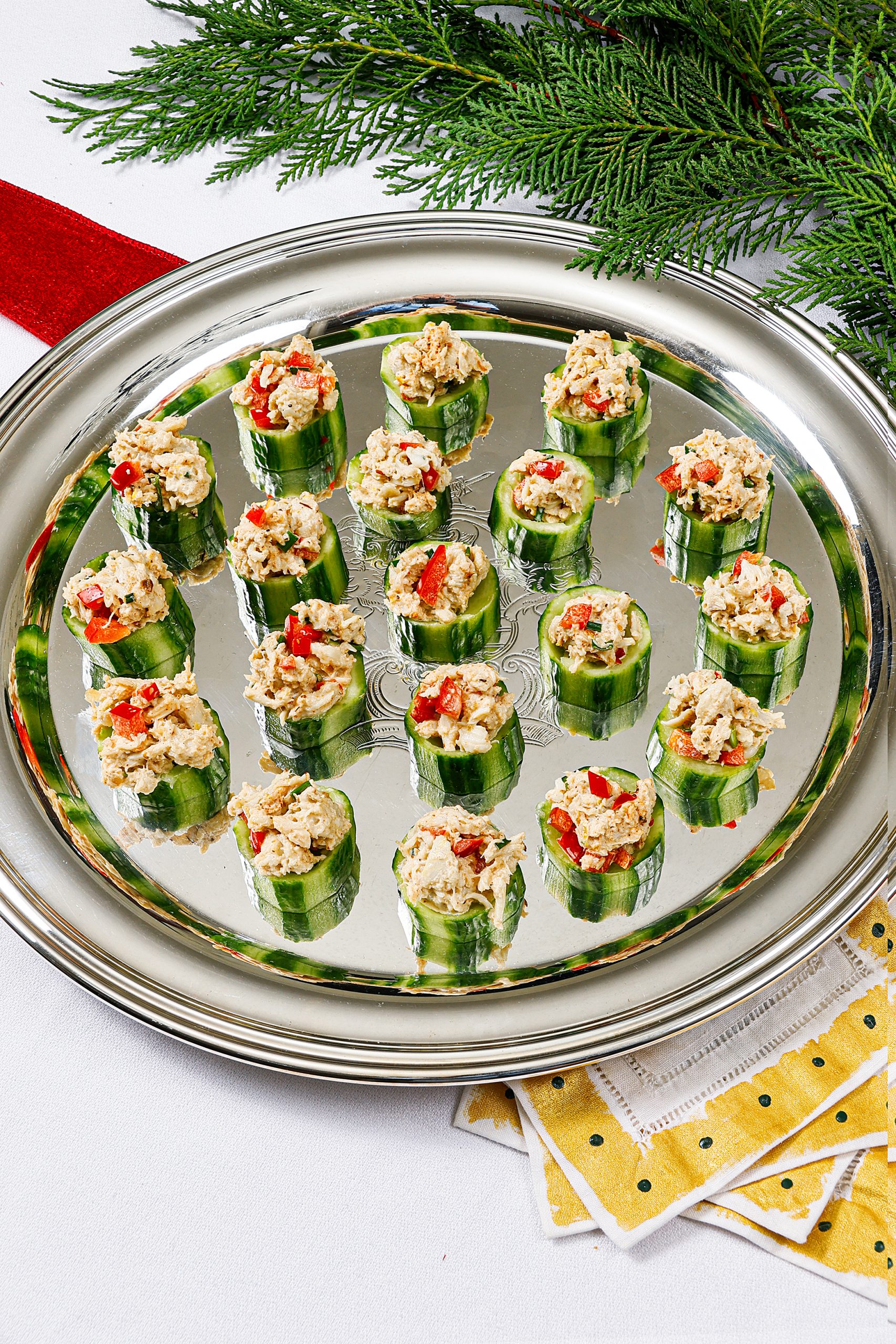 Cucumber Cups with Cajun Crab are delicious! Use a peeler to make striped cucumber skins for a holiday flair. 