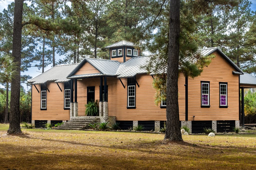 Ben Kelly’s Bamberg retreat, hunting lodge, and sanctuary is the loving restoration of Claflin School, an early 20th century rural school for African American children. Ben chose a local craftsman, Lowell Fralix, who was willing to source and transform reclaimed materials to complete the project. 