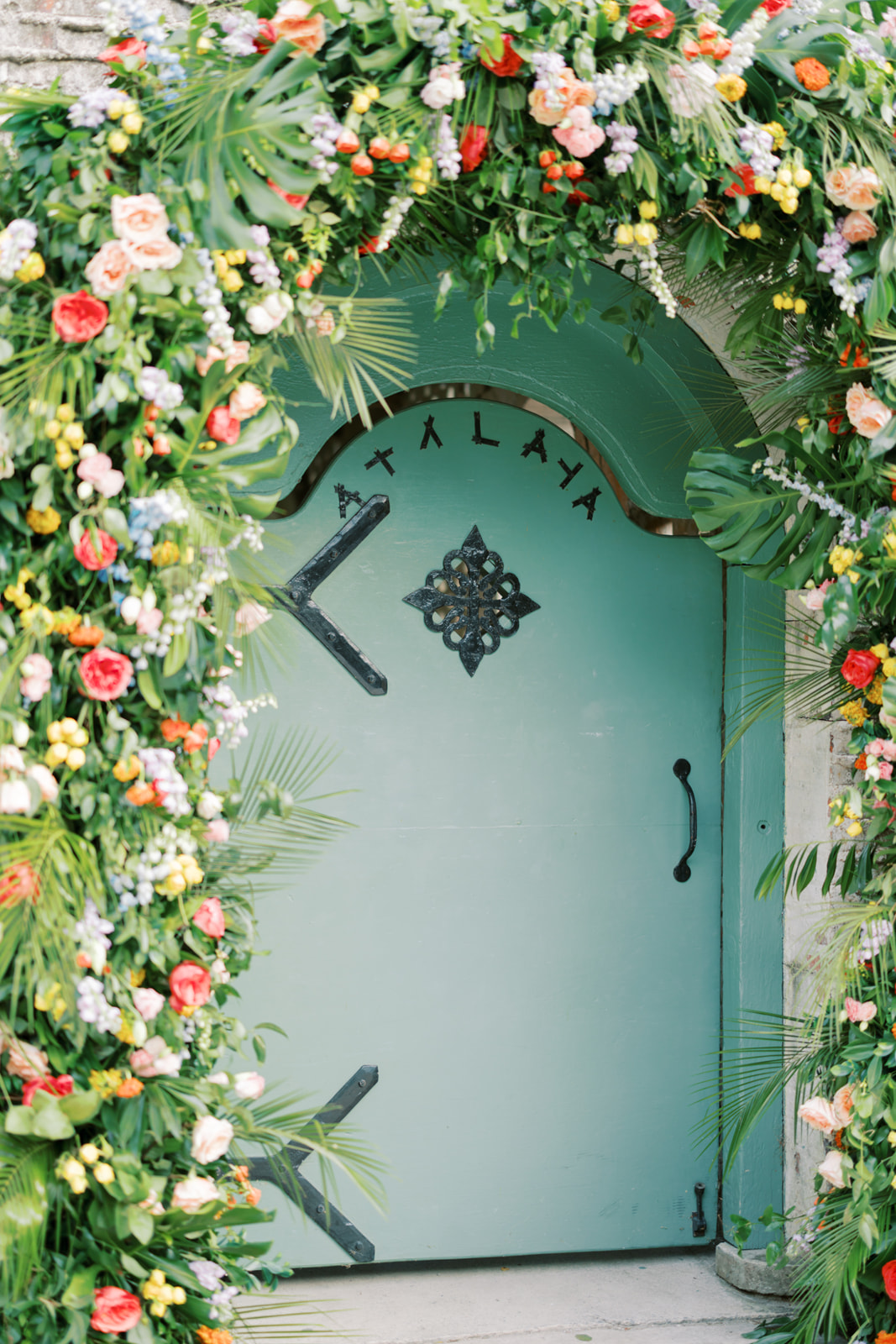 Sumner and her mother, who share a love of flowers, wanted the wedding to be a testament to that passion. However, Sumner did not want a select few color-coordinated flowers: “They’re all my favorite!” she says. Therefore, the whole affair was what Lauren describes as “a floral explosion!” 
